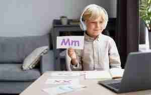 Young boy participating in Functional Training Communication ABA class online