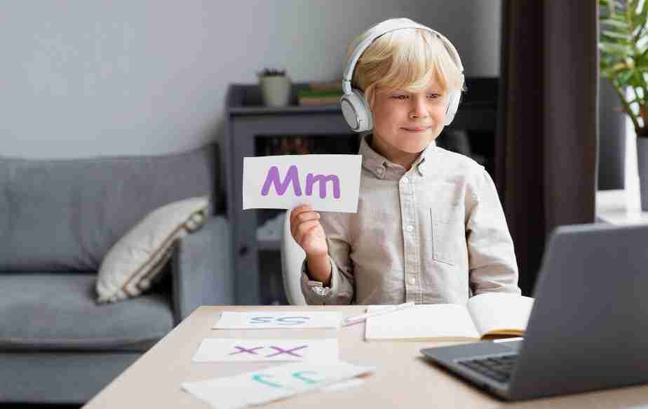 Young boy participating in Functional Training Communication ABA class online